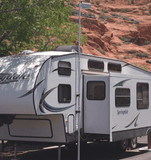 Telescoping pole and mount for RV antenna.