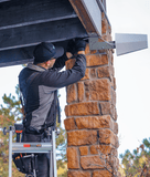 Installing outside antenna professionally after aiming towards cell tower.